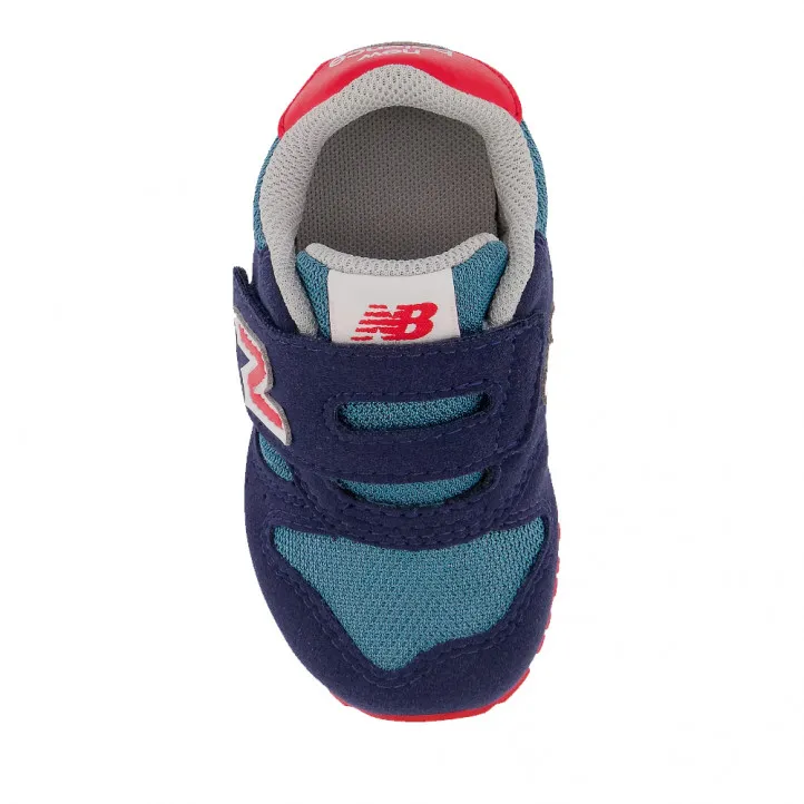 Zapatillas deporte New Balance 373 azules con zonas rojas